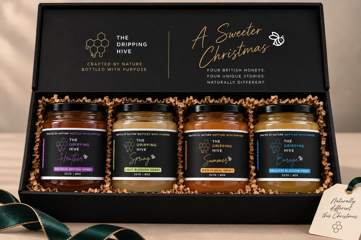 The Dripping Hive Christmas gift box with four full-size British honey jars